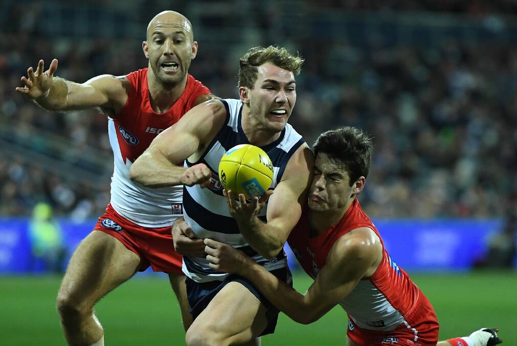 WAIT AND SEE: Geelong defender Jackson Thurlow. Picture: AAP