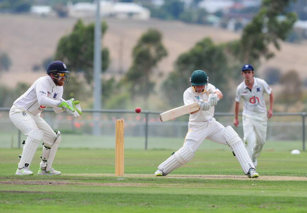 ON THE ATTACK: South Launceston wicket-keeper Tom Waller cuts backwards of square in an opening partnership of 59. Picture: Paul Scambler