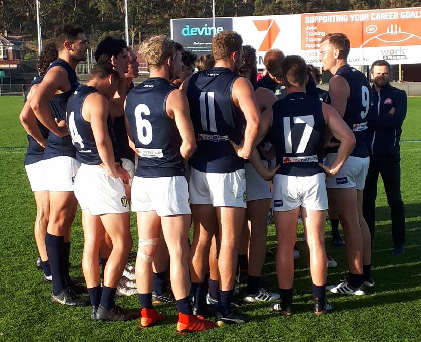 HUDDLE UP: Blues coach Mitch Thorp addresses his players at the quarter-time break. Picture: Twitter 