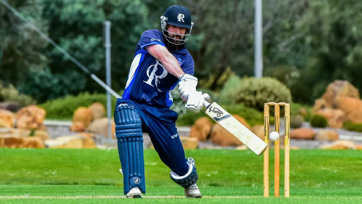 LASHING OUT: Riverside skipper Tom Garwood hits through the covers on his way to 54 in last round's win over Latrobe. Picture: Neil Richardson