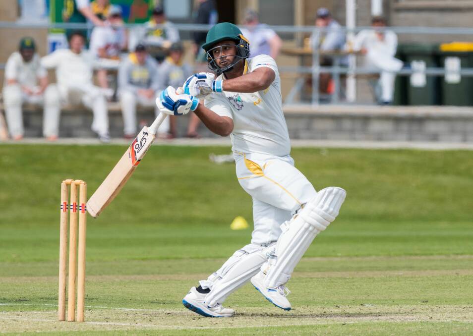 BIG HITTER: South Launceston batsman Sisitha Jayasinghe hooks vigorously en route to an equal team-high 68. Pictures: Phillip Biggs