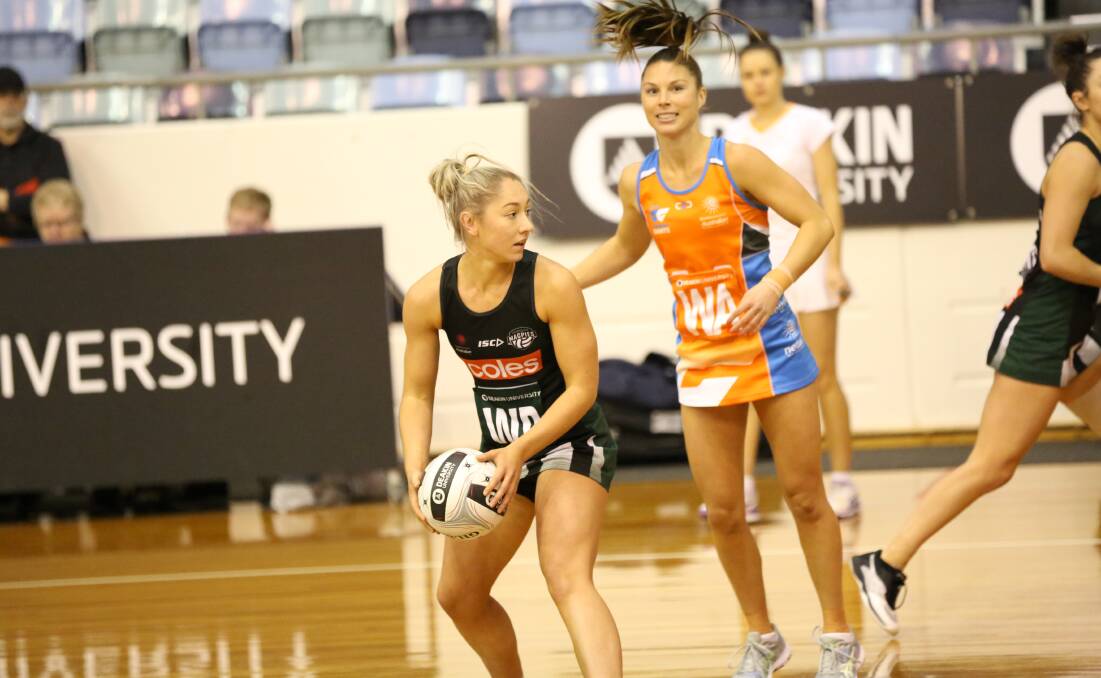 DIFFERENT YEAR: Shelby Miller in action for the Tasmania Magpies last season. Pictures: Netball Tasmania
