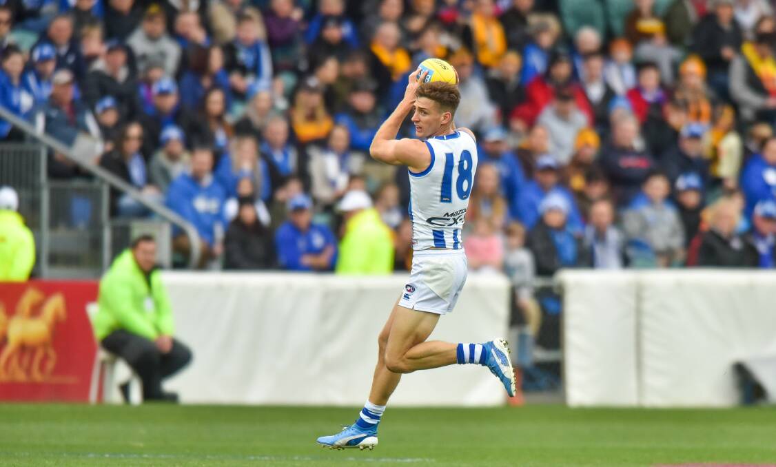 ROO AT THE TOP: North Melbourne 200-gamer Shaun Atley. The Kangaroos have been scheduled two Bellerive Oval fixtures next month. 