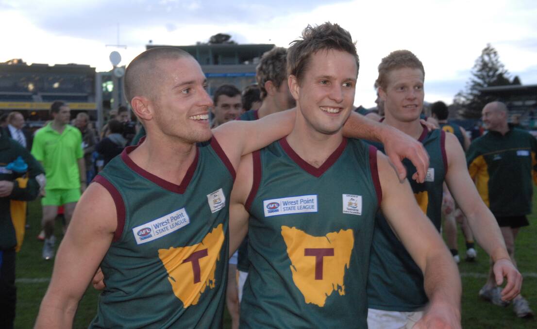 Clint Brown with fellow Tassie Devil Rhys Long in 2009. Picture: Paul Scambler