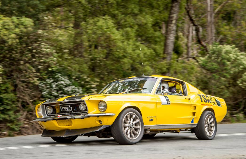 ALL YELLOW: North West Tasmanian David Thompson tests out his V8 Supercars specification 1967 Ford Mustang GT ahead of the Ross Auto Classic. Picture: Supplied 