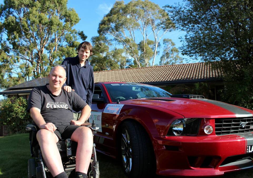 READY TO ROLL: Kickstart organiser Alan Stevenson shows off a Mustang Saleen to Launceston's Luke Rogers. This year's event will be held at the National Automobile Museum of Tasmania. Picture: Hamish Geale 