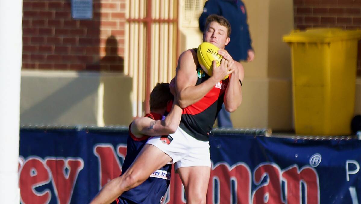 RUBBED OUT: Zach Burt marks on his chest in Saturday's win over North Hobart. Picture: Andrew Woodgate