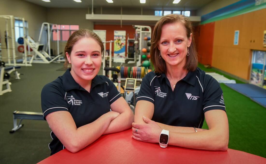 BOOST: Swimming coach Abbey Savage and hockey coach Jessica Blake are the newest Women in Sport scholarship holders. Picture: Paul Scambler