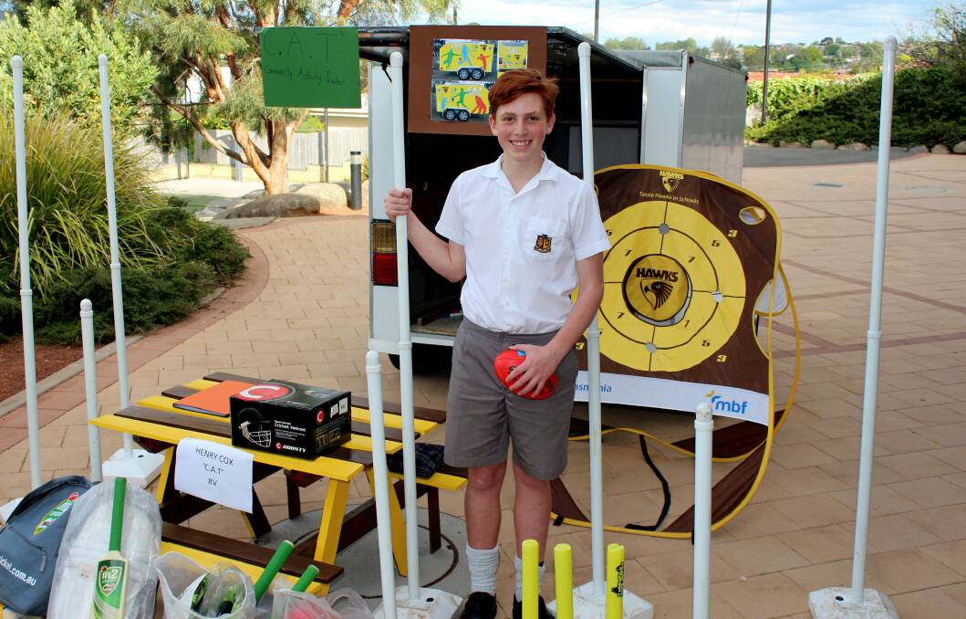 VARIETY VAN: Scotch Oakburn year 8 student Henry Cox with his Community Activity Trailer which will provide sporting equipment around Launceston. Picture: Hamish Geale