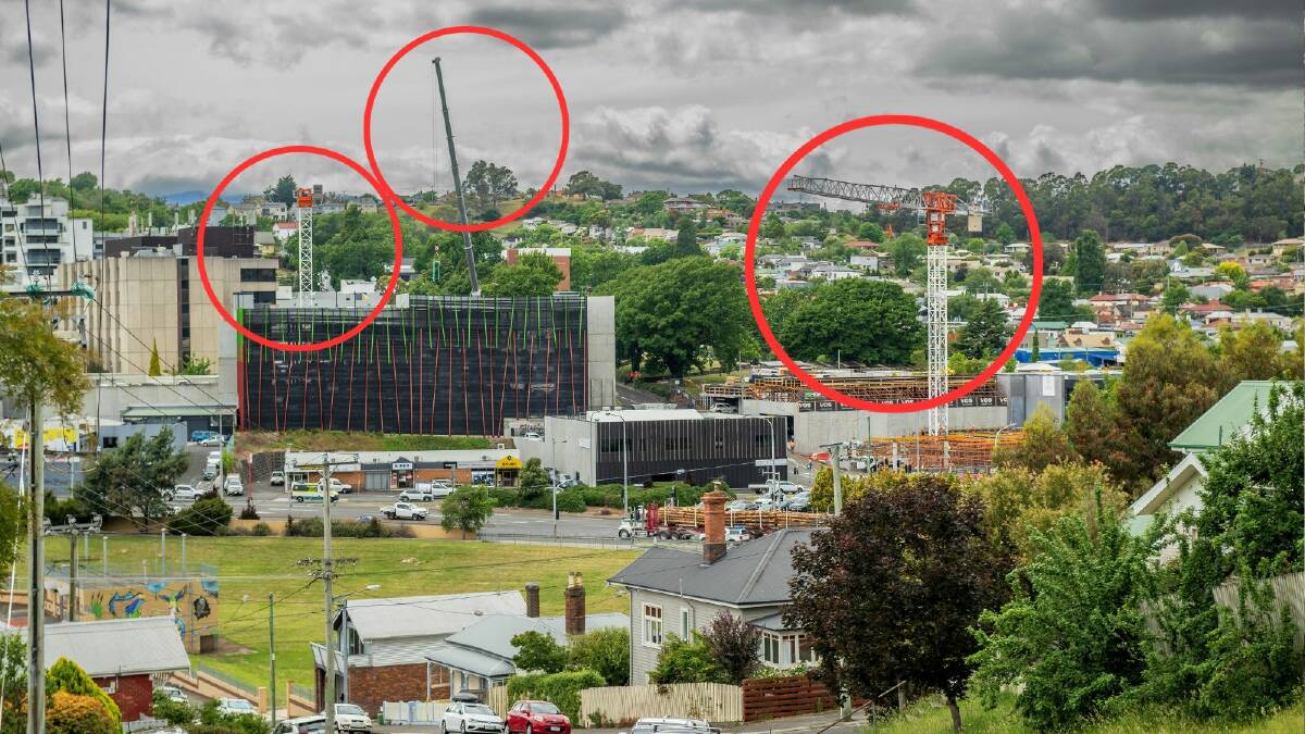 Construction of the new tower crane at Launceston General Hospital (left) and the Health Hub tower crane (right). Picture by Phillip Biggs 