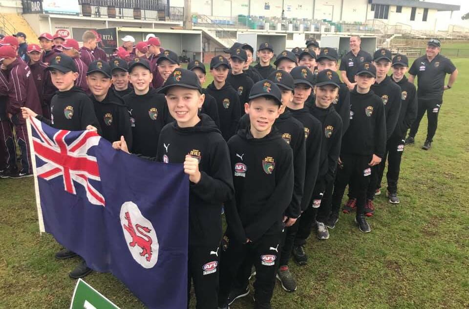UNITED AS ONE: The under-12s flying the flag for Tasmania in Western Australia. Picture: Facebook 