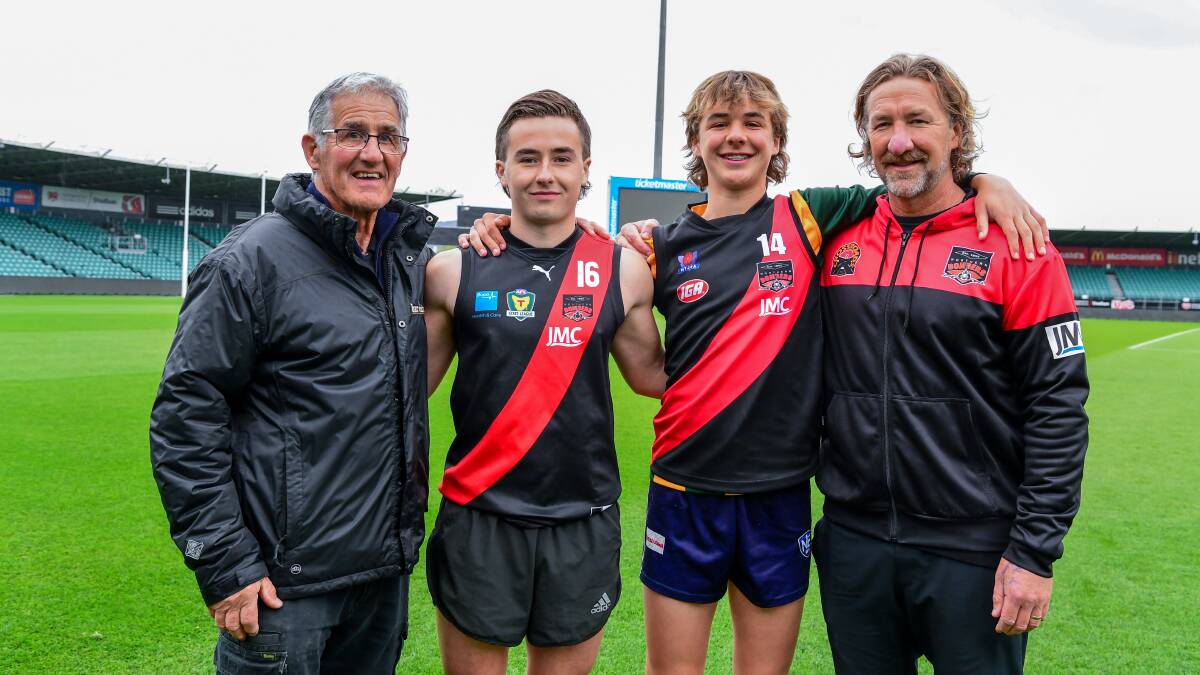 FAMILY CONNECTION: North Launceston legend Rob Sanders with grandsons Ollie, 18, and Ryley, 15, and son Adam. Picture: Neil Richardson