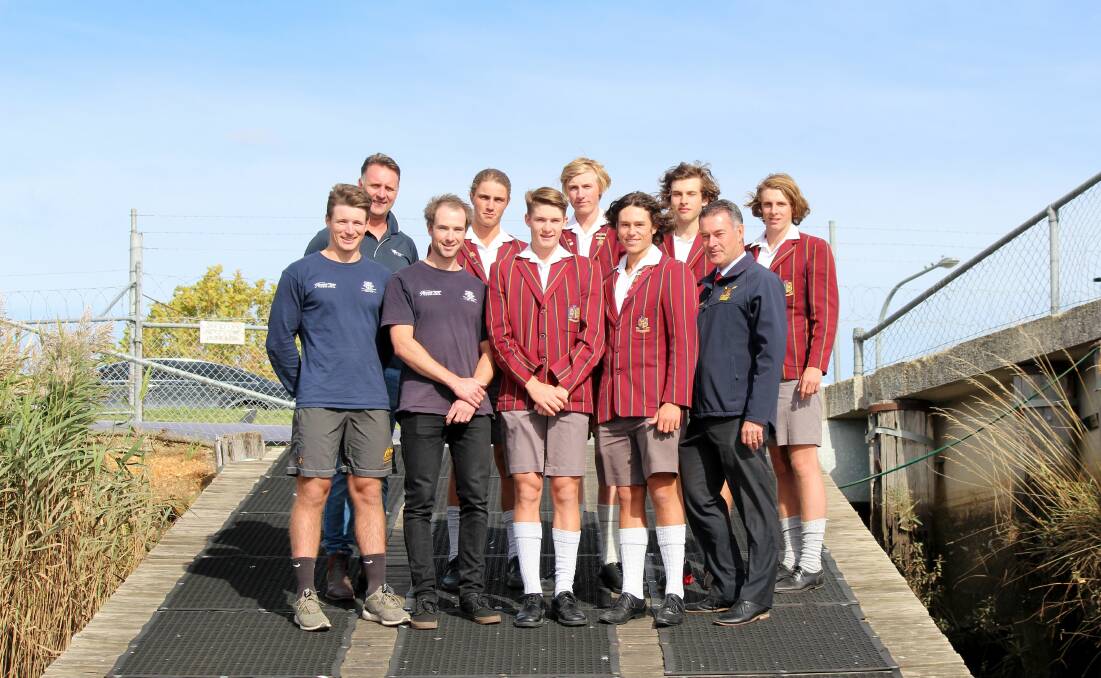 REPS: Tamar rowers Henry Youl and Oliver Marsden with TIS coach Brendan Long, members of the Scotch Oakburn under-19 coxed eight and head coach James Russell. Pictures: Hamish Geale
