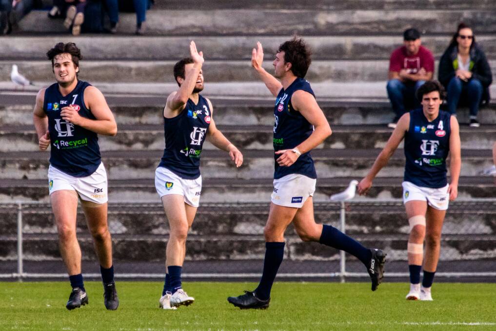 HERE WE GO: Experienced midfielders Jay Blackberry and Tim Bristow celebrate a goal in the Blues' win over Glenorchy. Picture: Solstice Digital