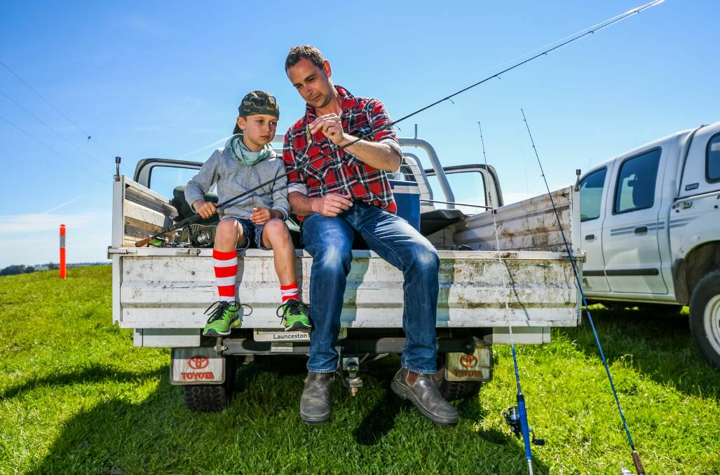 TEAM WORK: Lucas with his dad Stuart in 2017. Picture: Phillip Biggs