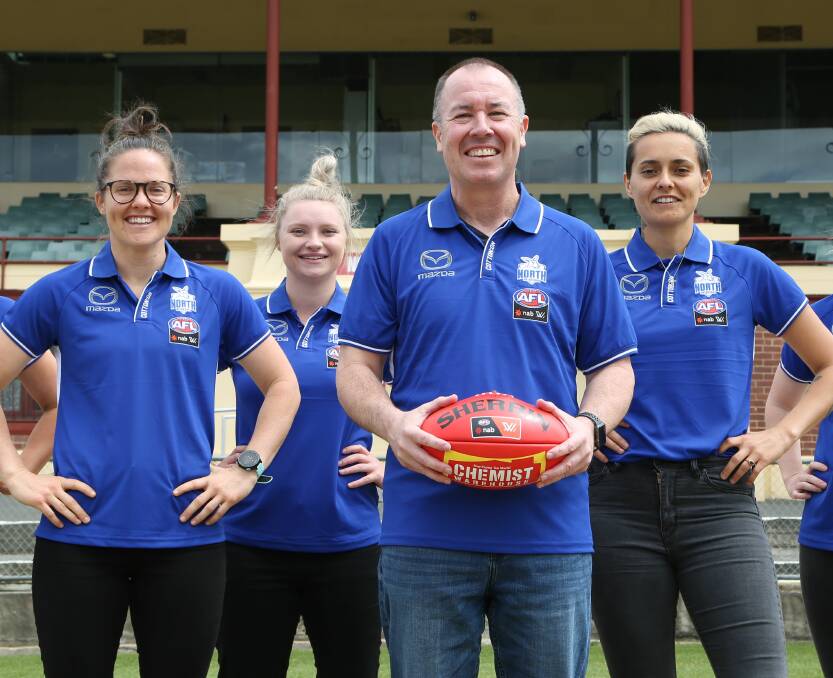 MAIDEN ROOS: AFLW stars Emma Kearney and Mo Hope flank ex-Launceston talent Daria Bannister and North Melbourne coach Scott Gowans.