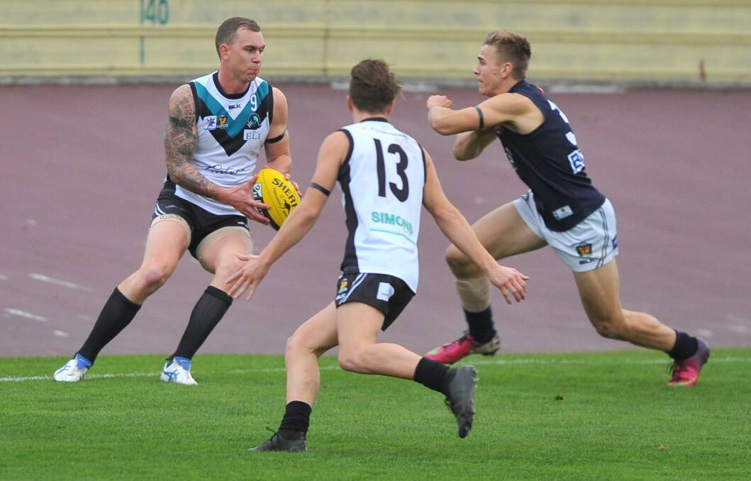 TALL TARGET: Devonport coach Mitch Thorp kicked 7.4 and took 14 marks in the Magpies' win over Launceston last season. Picture: Scott Gelston
