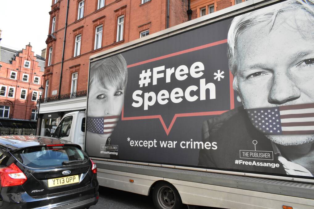 SILENCED: A big Wikileaks truck showing a picture of gagged whistleblowers Chelsea Manning and Julian Assange passes through the streets of London to spread awareness of the price of free speech last year. Picture: Shutterstock