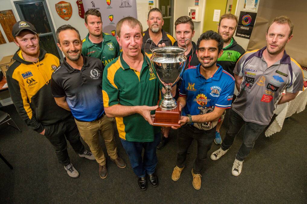 SET: TCL president Darrell Whyte and Cressy's Varun Nadesh with the Premier League cup along side Longford's Jackson Blair, ACL's John Kedey, Legana's Josh Allen, Beauty Point's Tony Garnsey, Hadspen's Liam Reynolds, Perth's Scott Thurley and Trevallyn's Luke Salmon. Picture: Phillip Biggs