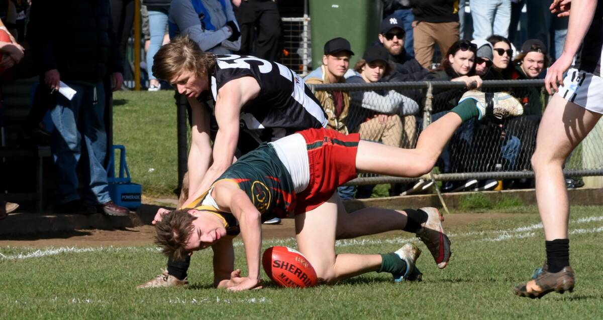 OVER AND OUT: Scottsdale's Jack Deacon brings down Bridgenorth's Max Lawrence in their 46-point elimination final victory at Longford. Picture: Neil Richardson