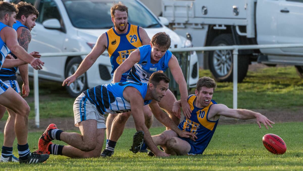 COME HERE: Evandale's James Conroy stretches for the ball against Bridport at Morven Park. Picture: Phillip Biggs