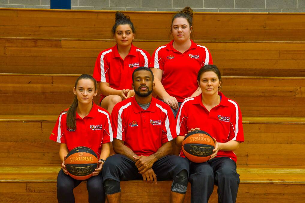 GAME FACES: Tornadoes coach Derrick Washington surrounded by Tasmanian talent Paige French, Ellie Collins, Jayde Brazendale and Ishoa-Jade Cook on Wednesday. Picture: Scott Gelston 