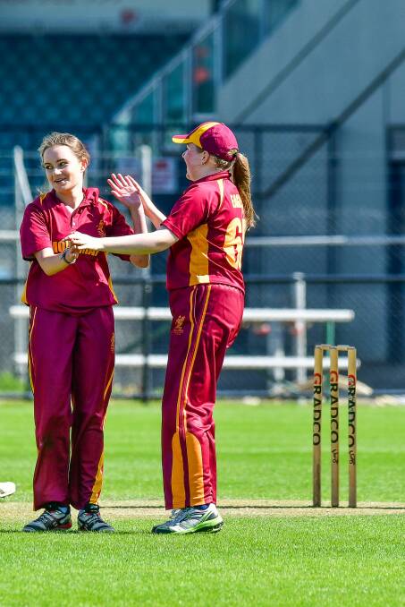 GOTCHYA: Mowbray's Emily Scott celebrates the wicket of Riverside's Rachel Archer. Pictures: Scott Gelston