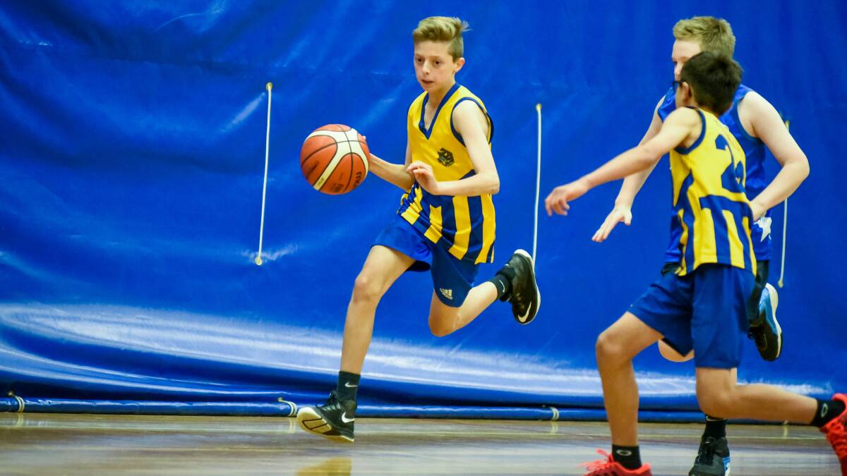 SOLID: Trevallyn's Cooper Wigg in action at Elphin Sports Centre on the weekend. 