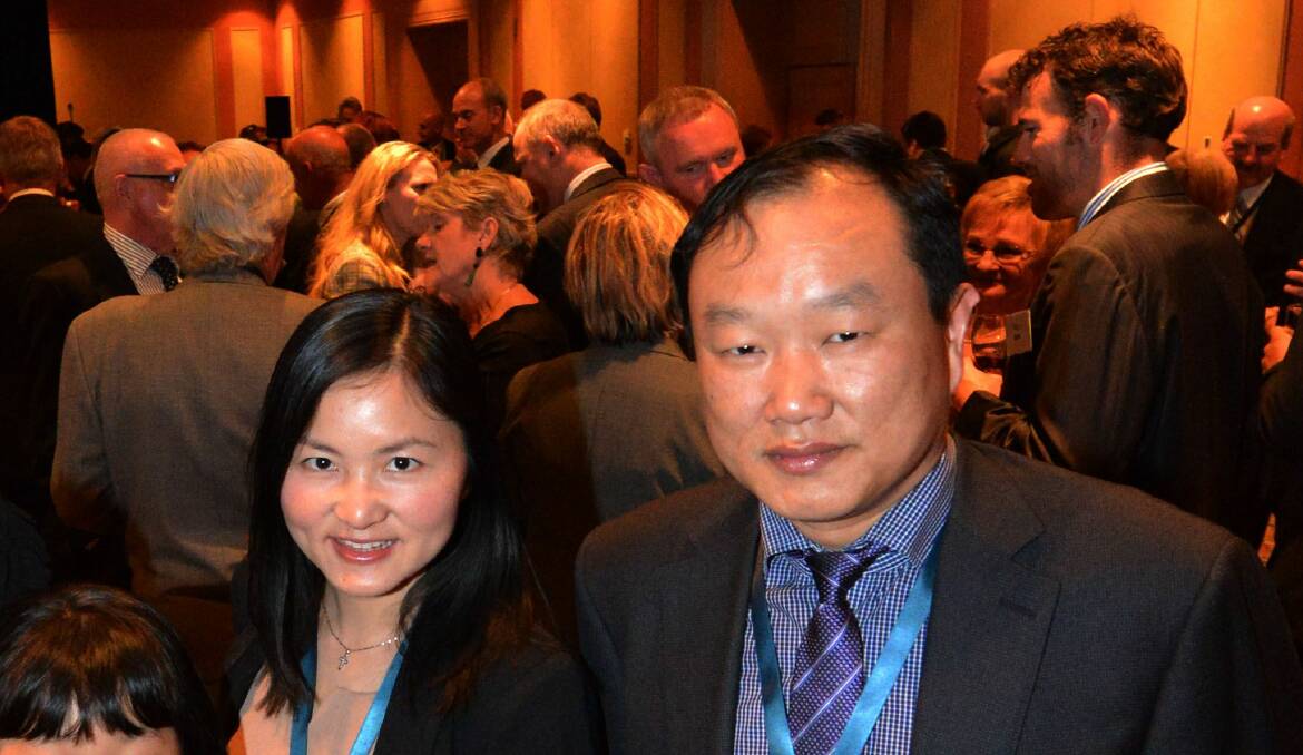 Eva Wu (centre) and Hui Qian (right) seen here at a TasInvest function in Launceston met Department of Economic Development officials in relation to visas in February 2014.