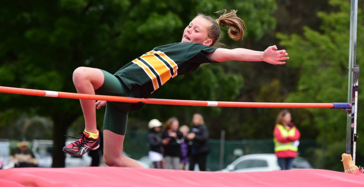 UP AND OVER: St Finn Barr's grade 4 high jumper Kate Healer in action.
