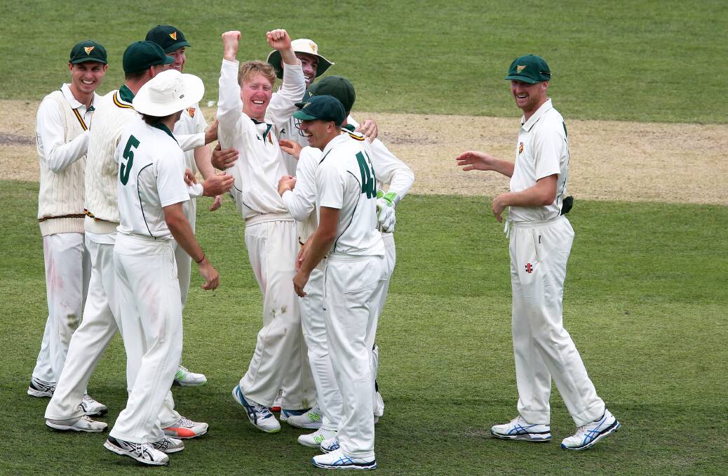 GOT HIM: Tasmania celebrate Jordan Silk's caught and bowled wicket of New South Wales wicketkeeper-batsman Peter Nevill at Bellerive Oval last week. The scalp sealed the Tigers back-to-back victories. Picture: AAP 