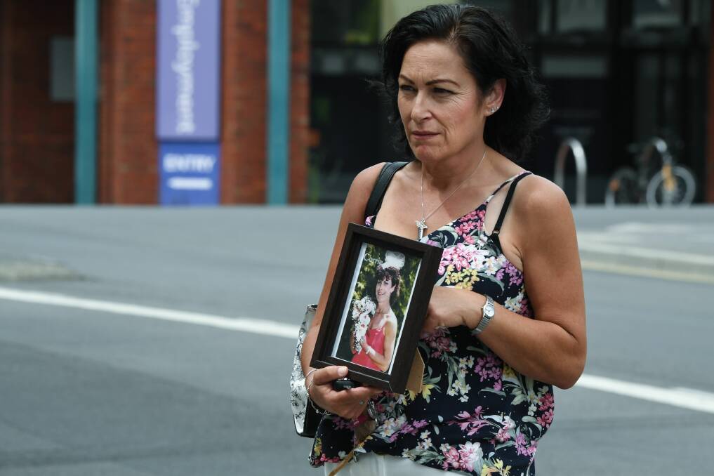 Tammy Stone of Hobart with picture of sister Corrie Stone. Picture: Neil Richardson