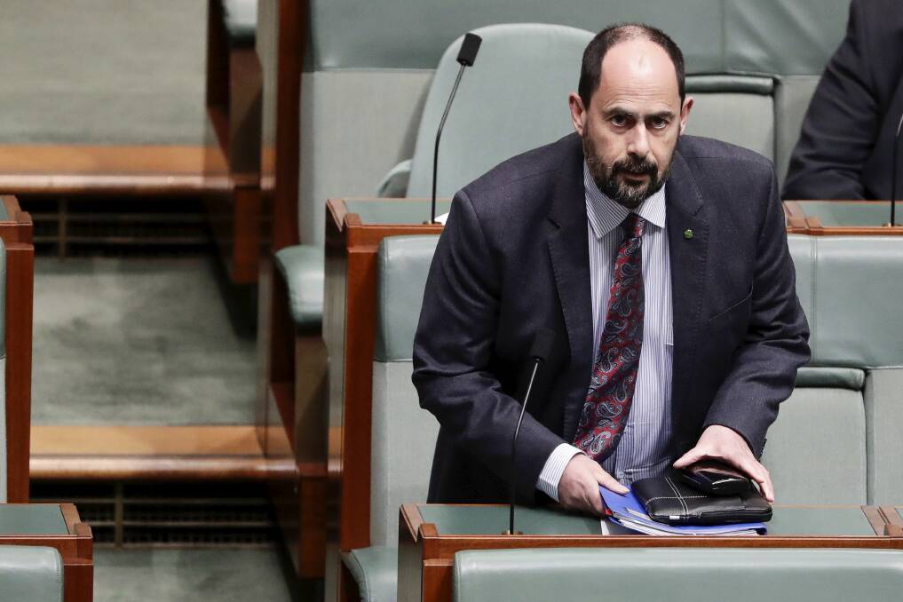 ON THE JOB: Bass Labor MHR Ross Hart in Parliament. Picture: AAP
