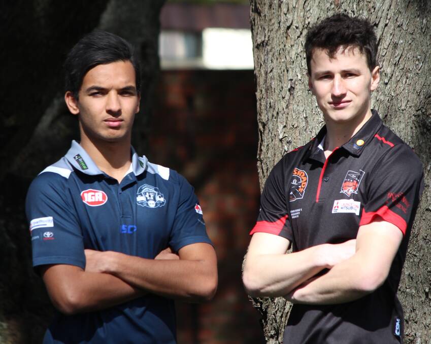 GAME FACES: Launceston star Grant Holt and Northern Bombers captain Nathan Jackson ahead of Saturday's development league finale at UTAS Stadium. Picture: Corey Martin