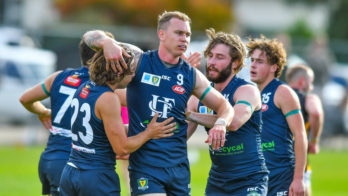 TICKED OFF: Blues forward-turned-coach Mitch Thorp celebrates a goal against Tigers last season.