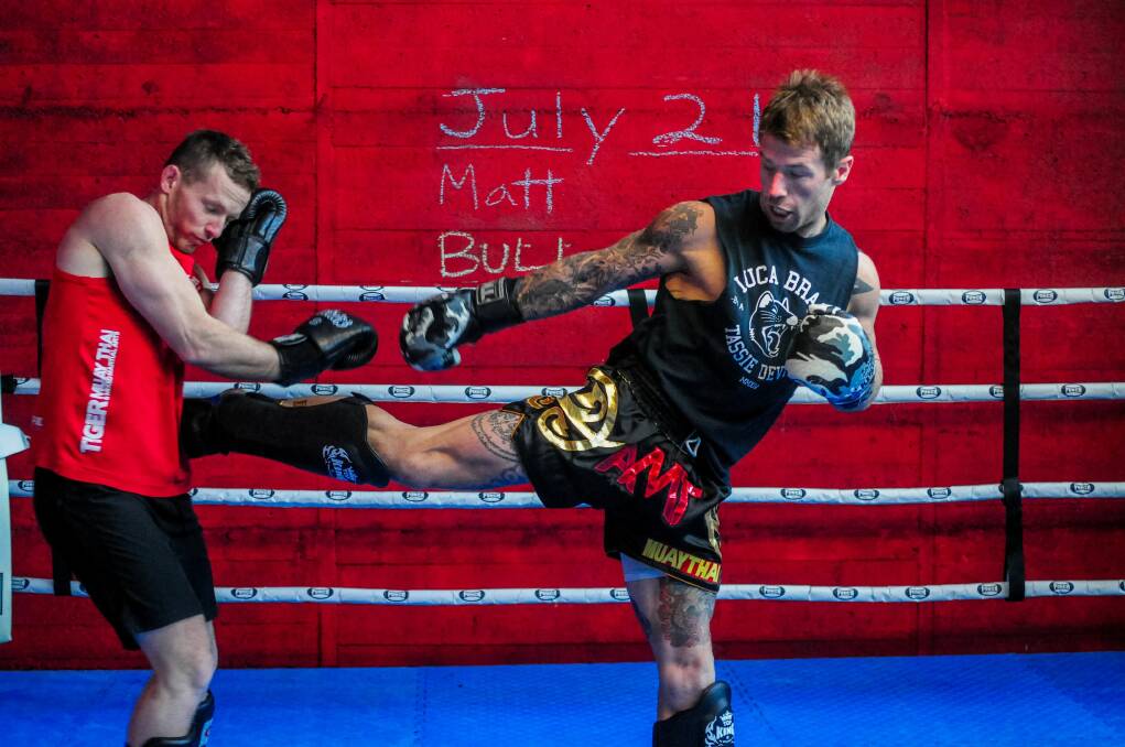 READY: Damon Upton-Greer and Nick Denholm spar in Launceston over the weekend in readiness for Legion 7. Picture: Neil Richardson 