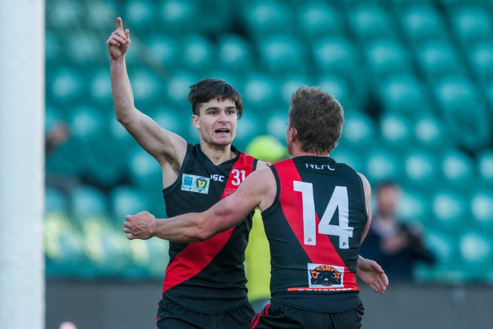 NUMBER ONE: North Launceston youngster Sherrin Egger celebrates a final-term goal with Tom Couch. Picture: Phillip Biggs