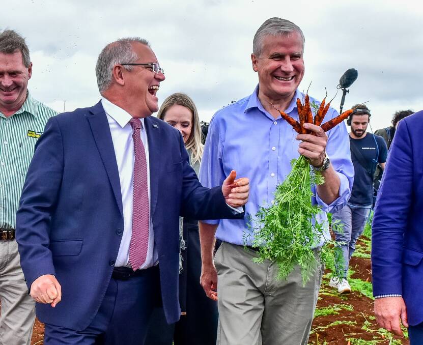 GOOD TIMES: Prime Minister Scott Morrison and Nationals leader Michael McCormack in Tasmania this week. Picture: Neil Richardson