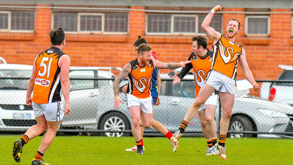OH BOY: East Coast star Michael Musicka celebrates a crucial third-quarter major at Invermay Park against reigning premier Lilydale. The Swans were gusty in bringing down the Demons by 18 points. Picture: Scott Gelston 