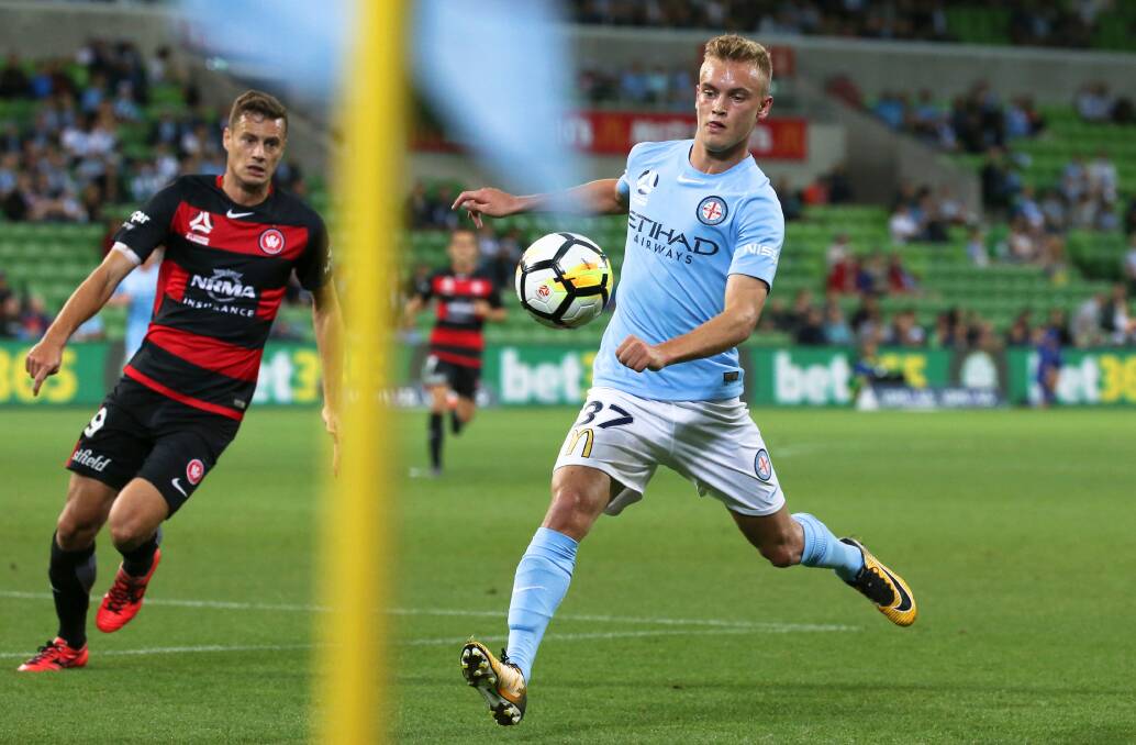 RISING STAR: Launceston's Nathaniel Atkinson in action for Melbourne City against Western Sydney Wanderers at AAMI Park. Picture: AAP 