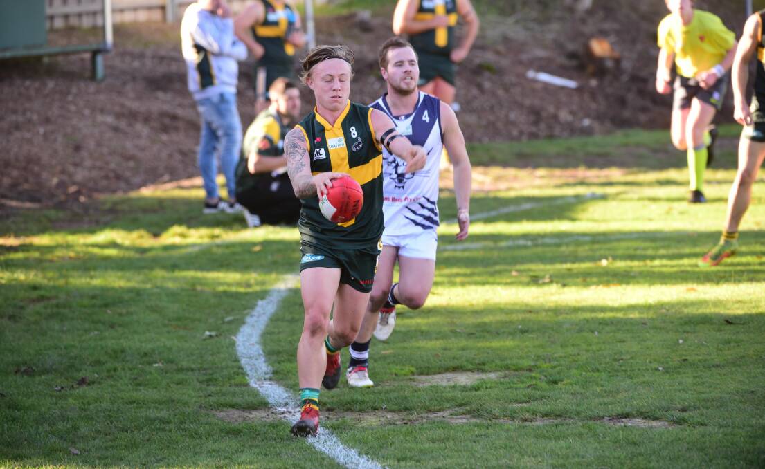 OUT OF BOUNDS?: St Pats midfielder Jacob Murphy converts a goal from hard against the line in the Saints' win over Tamar Cats. Picture: Paul Scambler