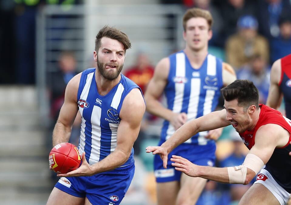 PLENTY TO PLAY FOR: Kangaroos defender Luke McDonald is tipping a tough contest when his side meets Hawthorn on Sunday. Picture: AAP 
