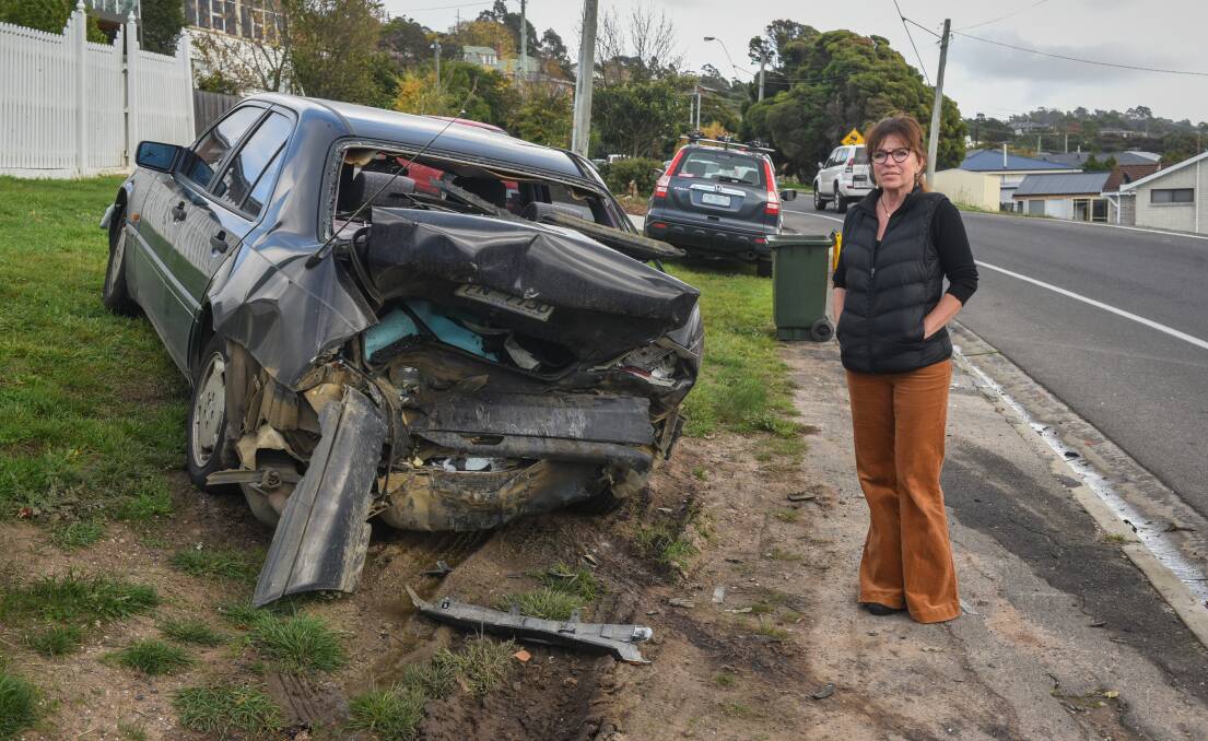 BANG: The damaged Mercedes Benz sedan of Edwina Joesler remains on the nature strip. Picture: Paul Scambler