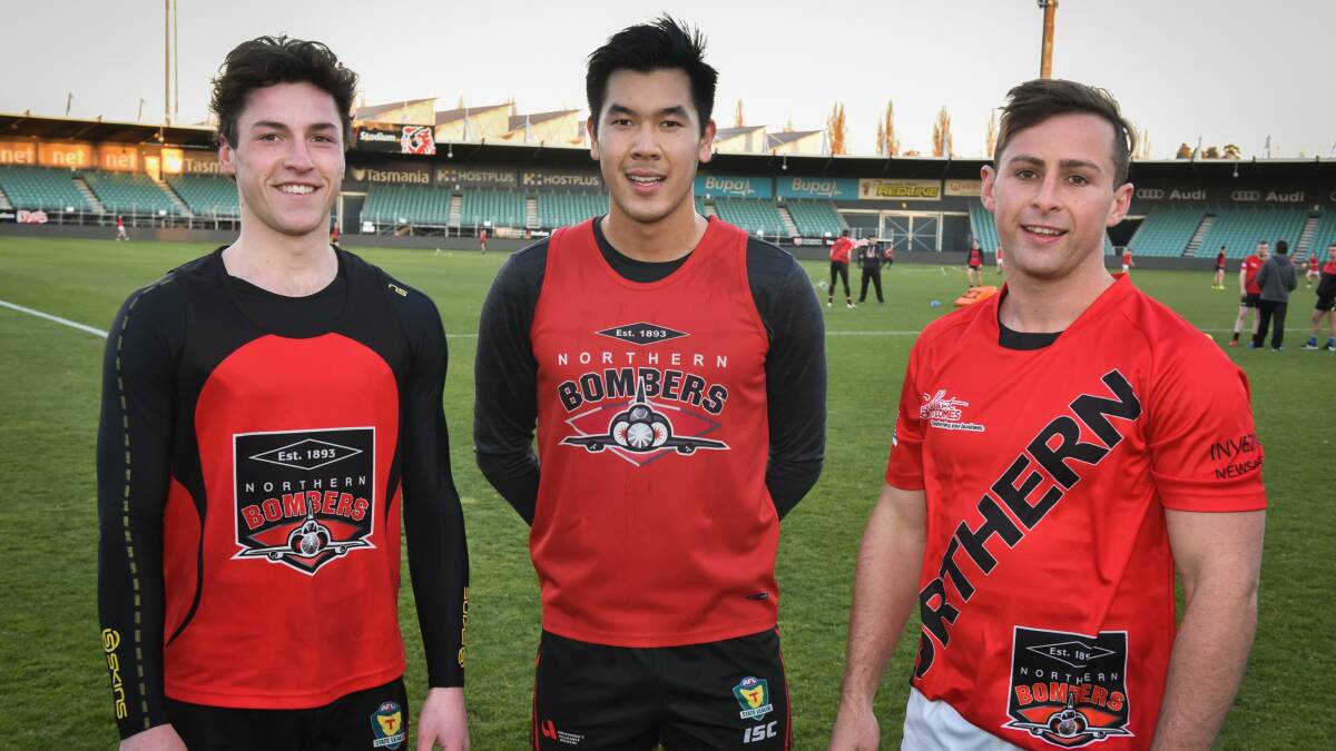 RELAXED: North Launceston fresh faces Fletcher Bennett, Michael Tang and Beau Sharman on the eve of their first final in red and black. Picture: Paul Scambler