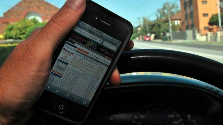 Letters to ed: Using phone while driving socially unacceptable