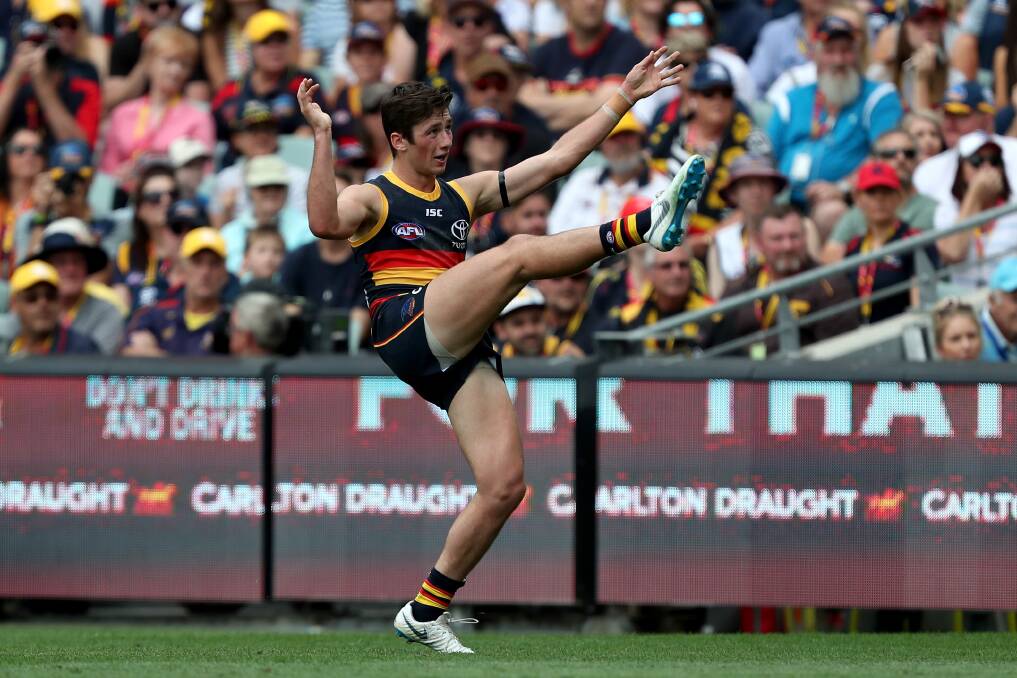 Bang: Chayce Jones kicks his first
AFL goal last season in round 1.
Picture: Getty Images