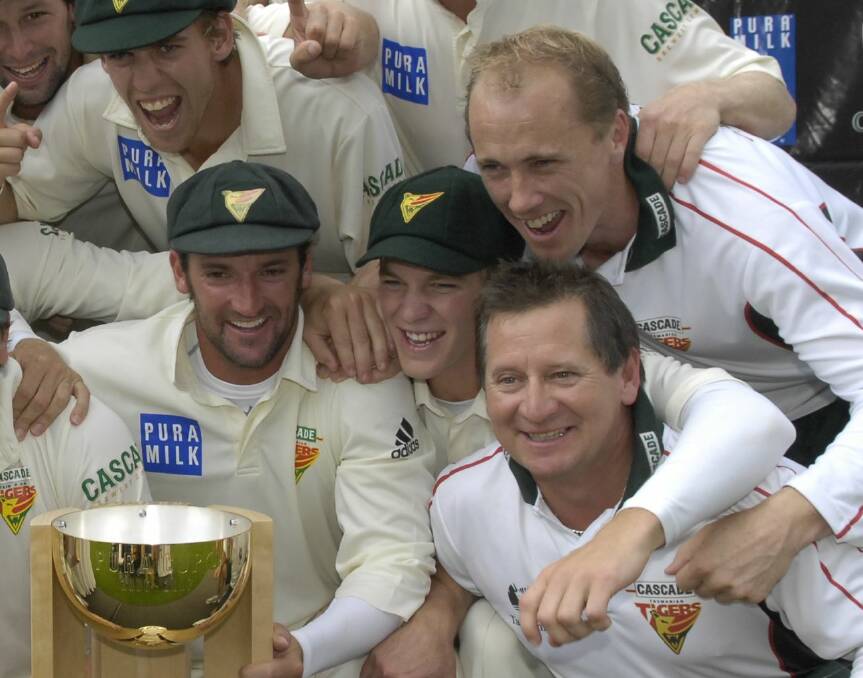 HAPPY TIMES: Tim Paine (centre) and Tim Coyle (right) celebrate winning the 2007 Sheffield Shield.