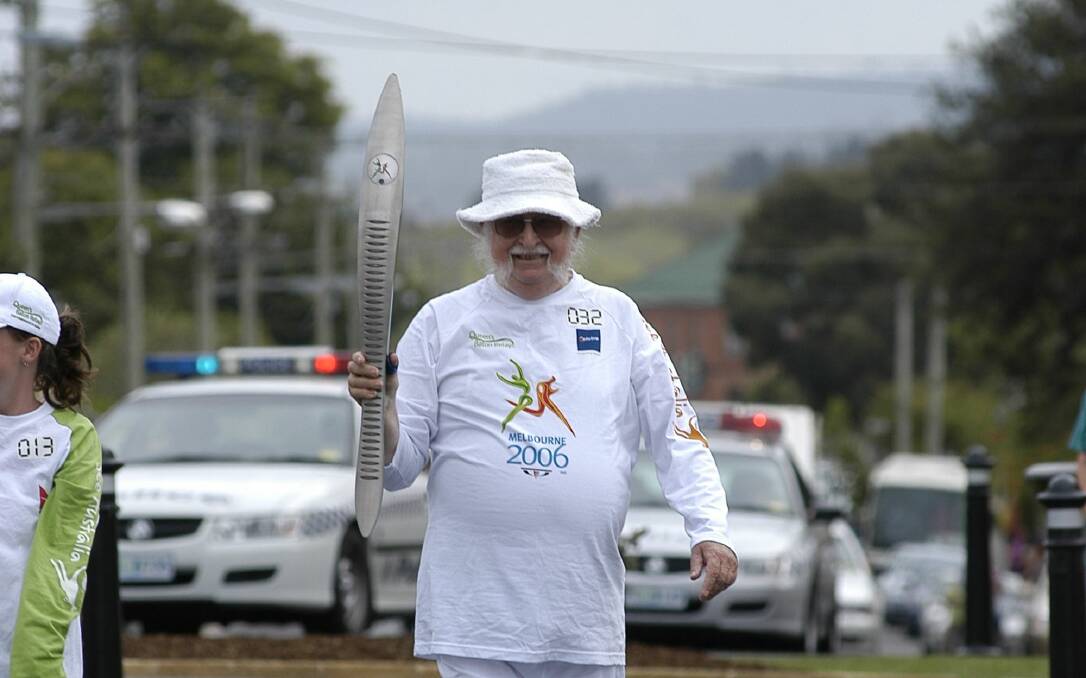CAPTION: Clive Lee during the 2006 Commonwealth Games baton relay. Picture: Glenn Daniels 