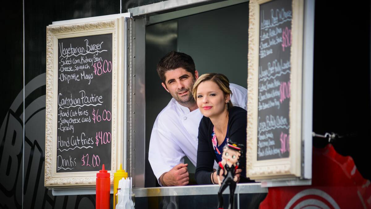 Cameron Gallagher and Sharla Karol with their truck Burger Junkie, in 2013. Burger Junkie is one of the food vans that take part in Eat Street.