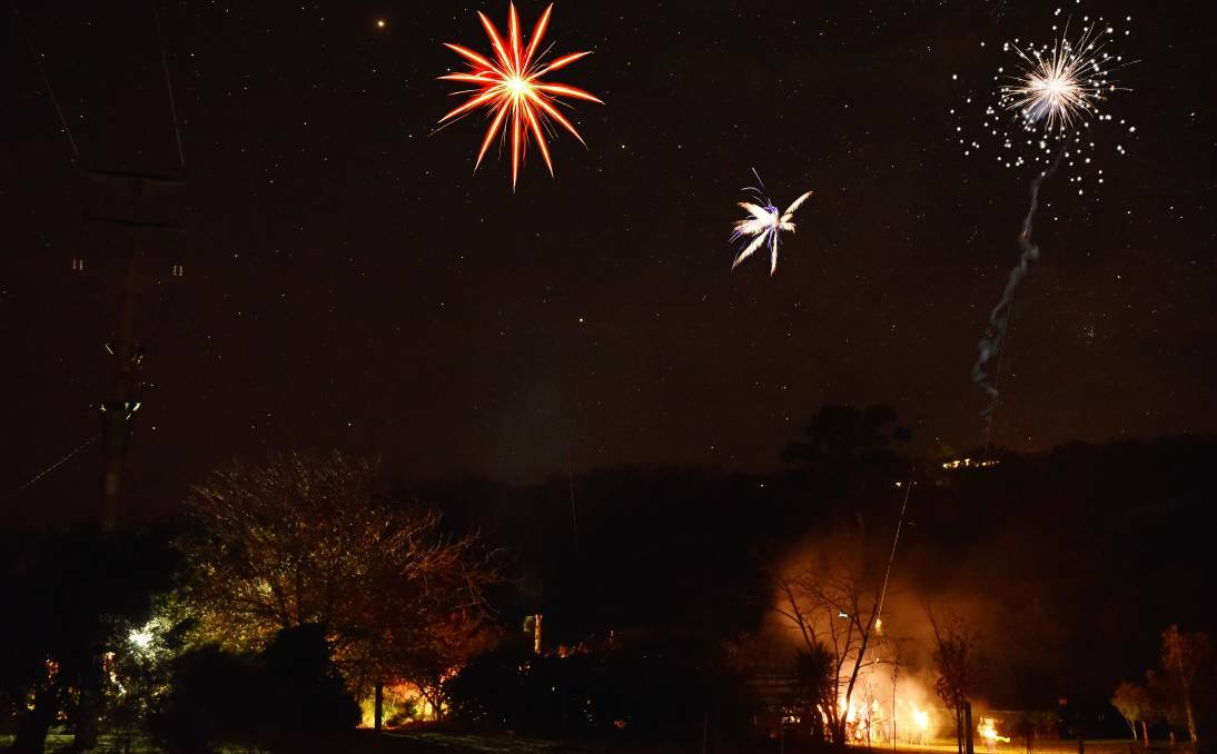  An array of fireworks illuminated the sky on Saturday at the Frankcombe property near Waverley for Cracker Night. Composite Ppicture: Scott Gelston